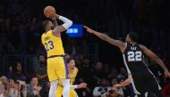 Los Angeles Lakers forward LeBron James (23) shoots against San Antonio Spurs forward Rudy Gay (22) during overtime at Staples Center. Gary A. Vasquez