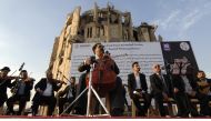 Renowned Iraqi maestro and cello player Karim Wasfi performs in Mosul’s war-ravaged Old City on November 10, 2018. AFP / Zaid AL-OBEIDI 