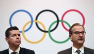 International Olympic Committee (IOC) sports director Kit McConnell (L) and spokesperson Mark Adams (R) attend a press conference in Tokyo on November 30, 2018. AFP / Behrouz Mehri
 