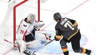 Washington Capitals goaltender Braden Holtby (70) makes a third period save against Vegas Golden Knights center William Karlsson (71) at T-Mobile Arena. Credit: Stephen R. Sylvanie-USA TODAY Sports
