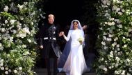 Prince Harry and Meghan Markle leave St George's Chapel at Windsor Castle after their wedding. Saturday May 19, 2018. Neil Hall/ via Reuters