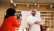 A visitor at one of the stalls at the ‘Meet Qatar New Year’ charity fair as part of QND celebrations in Moscow.