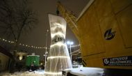 A wrapped Christmas tree can be seen at the Independent Christmas Town located at the Vilnius Railway Station in Vilnius, Lithuania, on December 19, 2018.  AFP / Petras Malukas 