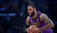 LeBron James #23 of the Los Angeles Lakers palms the ball before the game against the New Orleans Pelicans at Staples Center on December 21, 2018 in Los Angeles, California.  Harry How/AFP