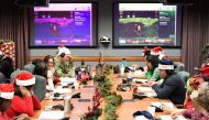 In this photo released by the US Airforce, volunteers work in the 2018 NORAD Tracks Santa Operation Center on Peterson Air Force Base in Colorado Springs, Colorado on December 24, 2018.  AFP PHOTO / US Airforce/ Staff Sgt. Alexandra M. Longfellow