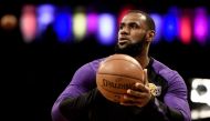 LeBron James #23 of the Los Angeles Lakers attempts a basket during warmups prior to the game against the Brooklyn Nets at Barclays Center on December 18, 2018 in New York City.  Sarah Stier/AFP 
