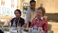 A handout image provided by United Arab Emirates News Agency (WAM) on December 24, 2018 shows Sheikha Latifa bint Mohammed bin Rashid Al-Maktoum (L) having a meal with Mary Robinson, former President of Ireland, at the Latifa's home in Dubai. AFP PHOTO / 