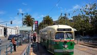 A streetcar painted in tribute to Philadelphia runs along the San Francisco waterfront in July. MUST CREDIT: Photo for The Washington Post by Justin Franz
