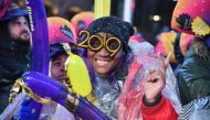 Revelers gather for the rainy New Year's Eve celebration in Times Square, New York, on December 31, 2018. AFP / Angela Weiss