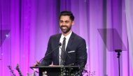 FILE PHOTO: Hasan Minhaj speaks during the Friends of The Saban Community Clinic's 42nd Annual Gala at The Beverly Hilton Hotel in Beverly Hills, California.   AFP / Jesse Grant