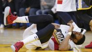 New Orleans Pelicans forward Anthony Davis (23) reacts after an injury against the Golden State Warriors during the fourth quarter at Oracle Arena. Kyle Terada