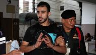 FILE PHOTO: Hakeem AlAraibi, a former member of Bahrain's national soccer team who holds a refugee status in Australia arrives at court after he was arrested last month on arrival at a Bangkok airport based on an Interpol notice issued at Bahrain's reques