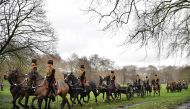 Members of the King's Troop Royal Horse Artillery stage a 41 gun salute to mark the 67th anniversary of Queen Elizabeth II's ascension to the Throne in Green Park, Central London on February 6, 2019.  AFP / Ben Stansall 