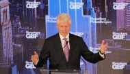 Former US President Bill Clinton speaks at the opening session of the Global Bloomberg Forum at the Plaza hotel on September 20, 2017 in New York. (AFP/ludovic Marin) 