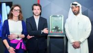 Catherine Eberle Devaux (left), Heritage Director; Paul Boissonnet, Brand Director of TAG Heuer; and Nasr Al Majed, Al Majed Jewellery Business Development Director, during the Doha Jewellery and Watches Exhibition held at DECC. pic: Baher Amin / The Peni