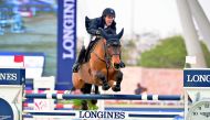 Maikel van der Vleuten guiding Arera C over a hurdle on his way to win the CSI5* 1.45m competition at Al Shaqab Arena, yesterday. 