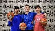 Bernard Murina, 17-year-old Roma, Hevzi Imeri, 17-year-old Albanian and Branislav Prokopijevic, 18-year-old Serbian, pose for a picture during a training session of their basketball club 