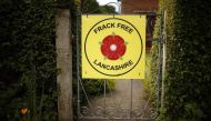 FILE PHOTO: An anti-fracking sign is seen on the gate of a cottage in the village of Little Plumpton, Lancashire, Britain June 23, 2015. Reuters/Phil Noble 