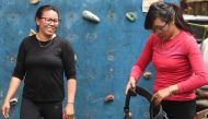 In this picture taken on February 12, 2019 Furdiki Sherpa (L) and Nima Doma Sherpa (R), the Nepali widows of mountaineers, train at a climbing gym in Kathmandu. AFP / Prakash Mathema