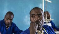 Serubanza Boniface, a former FLDR combattant, attends a class at a vocational training centre at the Reintegration and Demobilisation Centre in Mutobo, some 100 kilometres (60 miles) north-west of Kigali and beneath the Virunga mountains, on March 5, 2019