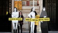 FILE PHOTO: Demonstrators from Amnesty International stage the protest on International Women's day to urge Saudi authorities to release jailed women's rights activists Loujain al-Hathloul, Eman al-Nafjan and Aziza al-Yousef outside the Saudi Arabian Emba