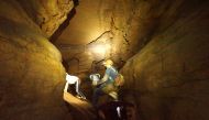 Guide Lester Zook, center, chose this cave in Franklin, W. Va., for its kid-friendly passages. MUST CREDIT: Photo for The Washington Post by John Briley