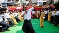 Students from Dagon University perform Burmese traditional slam poetry or thangyat during Burmese New Year in Yangon, Myanmar, April 13, 2019. Reuters/Ann Wang