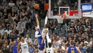 Jamal Murray #27 of the Denver Nuggets shoots over LaMarcus Aldridge #12 of the San Antonio Spurs during Game Six of the first round of the 2019 NBA Western Conference Playoffs at AT&T Center on April 25, 2019 in San Antonio, Texas.  Ronald Cortes/AFP 
