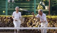 In this file photo taken on August 27, 2013, Japanese Emperor Akihito and Empress Michiko play tennis at  mountain resort Karuizawa in Nagano prefecture, Japan. AFP/Jiji Press