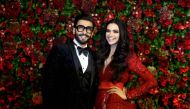 Indian Bollywood actors Ranveer Singh (L) and Deepika Padukone pose for a photograph during their wedding reception party in Mumbai. (AFP/ File Photo)