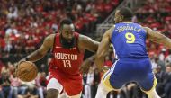 Houston Rockets guard James Harden (13) dribbles the ball as Golden State Warriors guard Andre Iguodala (9) defends during the third quarter in game three of the second round of the 2019 NBA Playoffs at Toyota Center. Troy Taormina