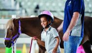 A file picture of a child taking part in a training session at Al Shaqab Arena in this file picture.