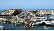 (FILES) File picture shows fishing boats moored to a dock in the embattled Yemeni Red Sea port city of Hodeida.