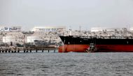 A picture taken on March 12, 2017 shows an Iranian tanker docking at the platform of the oil facility in the Khark Island on the shore of the Gulf. AFP/Atta Kenare