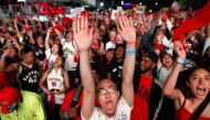 FILE PHOTO: Toronto Raptors fans cheers as they gather to watch Game 4 of the NBA Finals series outside Scotiabank Arena at 'Jurassic Park' in Toronto, Canada.  AFP / GETTY IMAGES NORTH AMERICA / Cole Burston