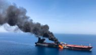 An oil tanker is seen after it was attacked at the Gulf of Oman, June 13, 2019. 