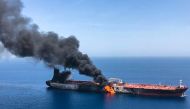 A picture obtained from Iranian News Agency on June 13, 2019 shows fire and smoke billowing from Norwegian owned Front Altair tanker said to have been attacked in the waters of the Gulf of Oman. AFP/ISNA