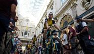 Team Jumbo-Visma riders Mike Teunissen of the Netherlands and Wout Van Aert of Belgium during the teams presentation, at St-Hubert Gallery in Brussels. Reuters/Johanna Geron