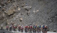 In this picture taken on June 30, 2019, Pakistani and international cyclists take part in the Tour de Khunjerab, one of the world's highest altitude cycling competitions, near the Pakistan-China Khunjerab border.  AFP / AAMIR QURESHI 