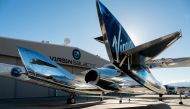 (FILES) In this file photo taken on February 22, 2019 courtesy of Virgin Galactic, SpaceShipTwo mates to the mothership, WhiteKnightTwo, at Mojave Space Port on February 19, 2019, in Mojave, California. AFP PHOTO / Virgin Galactic