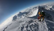 In this file photo taken on May 17, 2018, mountaineers make their way to the summit of Mount Everest as they ascend on the south face from Nepal. AFP/Phunjo Lama