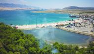 This aerial view taken on July 16, 2019, shows a general view of Zrce beach on the northern Croatian island of Pag.  AFP