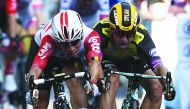 Australia's Caleb Ewan (L) sprints with Netherlands' Dylan Groenewegen to win on the finish line of the eleventh stage of the 106th edition of the Tour de France cycling race between Albi and Toulouse, in Toulouse on July 17, 2019. AFP / Anne-Christine Po