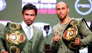 Philippine boxer Manny Pacquiao (L) and US boxer Keith Thurman pose as they hold their final press conference at the MGM Grand Hotel & Casino on July 17, 2019 in Las Vegas, Nevada, ahead of their July 20th WBC welterweight fight.  AFP / John Gurzinski