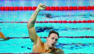  In this file photo taken on December 16, 2018 Caeleb Dressel of the US reacts after winning the men's 100m freestyle final at the 14th FINA World Swimming Championships in Hangzhou in China's eastern Zhejiang province. AFP 