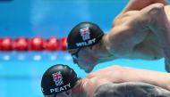 Britain's Adam Peaty competes in the final of the men's 100m breaststroke event during the swimming competition at the 2019 World Championships at Nambu University Municipal Aquatics Center in Gwangju, South Korea, on July 22, 2019. / AFP / Ed Jones