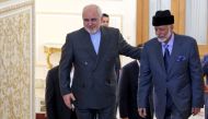 Oman's Minister of State for Foreign Affairs Yousuf bin Alawi bin Abdullah (R) is greeted by Iran's Foreign Minister Mohammad Javad Zarif in Tehran on July 27, 2019. (AFP / ATTA KENARE)