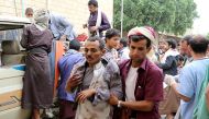 A man injured by an air strike on a market in Yemen's Saada province arrives to receive medical attention at a local Al Jomhouri hospital in Saada, Yemen July 29, 2019. REUTERS/Naif Rahma