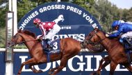 Jockey Olivier Peslier  (left) and H H Sheikh Abdullah bin Khalifa Al Thani-owned French King winning the 129th Longines Grosser Preis von Berlin (Gr1) at Hoppegarten, in Germany, on Sunday.
