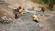 A woman works at a quarry in Muiru village, central Kenya on July 16, 2019. Thomson Reuters Foundation/Kagondu Njagi